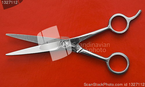 Image of Scissors on red background