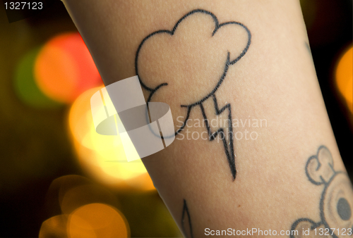 Image of lightning and sky tattoo 