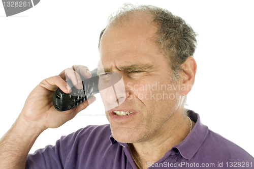 Image of man middle age emotional upset angry telephone conversation