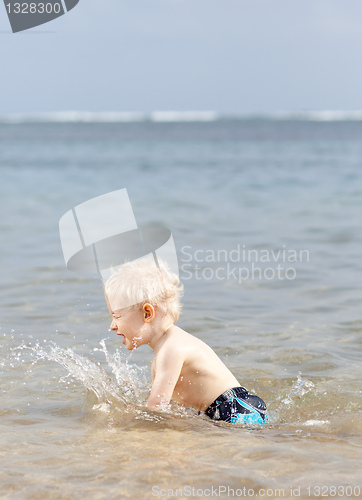 Image of splashing toddler