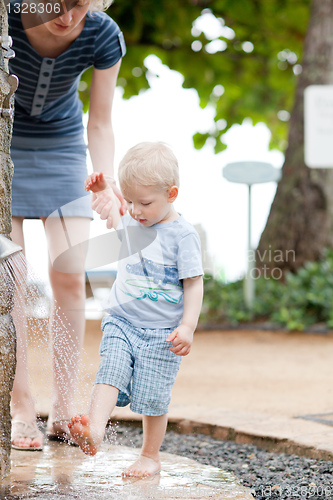 Image of mother helping son