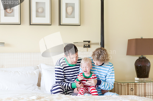 Image of family with crying toddler