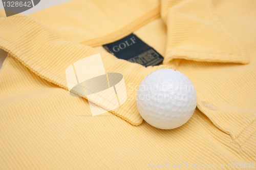 Image of Golf Ball and Polo Shirt