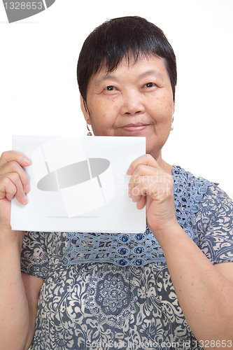 Image of Concept photo of Asian woman holding a white card