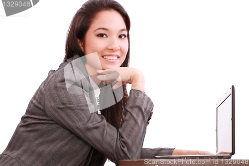 Image of beautiful asian woman using her laptop