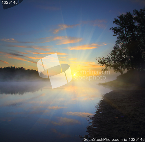 Image of beautiful fog sunrise on river