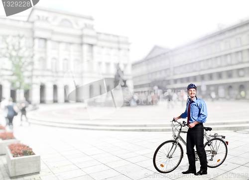 Image of businessman with bicycle