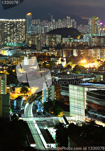 Image of apartment building at night