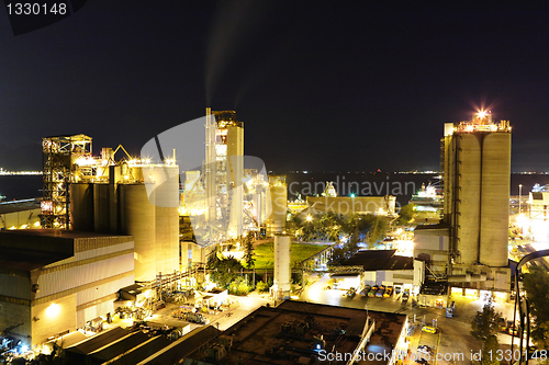 Image of cement factory at night