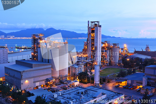 Image of cement factory at night