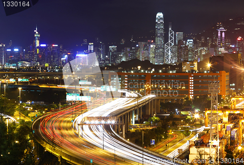 Image of modern city and highway at night