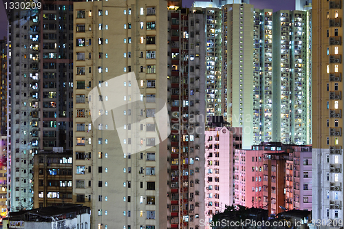 Image of apartment building at night