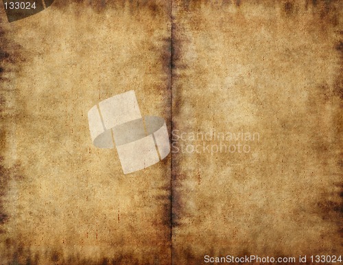 Image of Unfolded book dark smudged paper