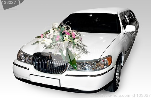 Image of White wedding limo