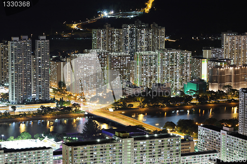 Image of apartment building at night