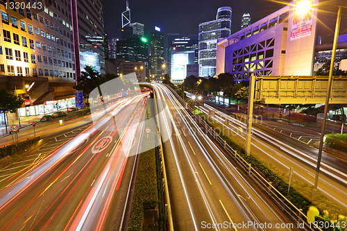 Image of Fast moving cars at night