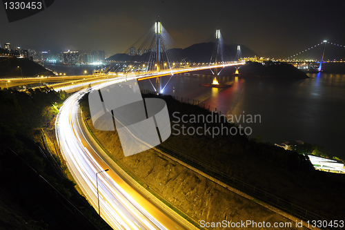 Image of highway and Ting Kau bridge at night