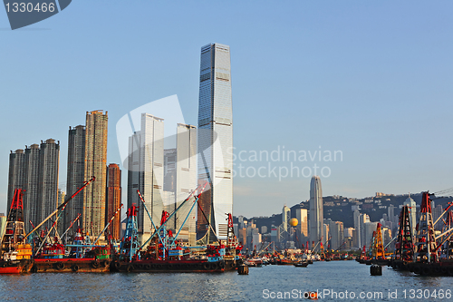 Image of Hong Kong harbour with working ship