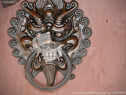 Image of oriental door knocker