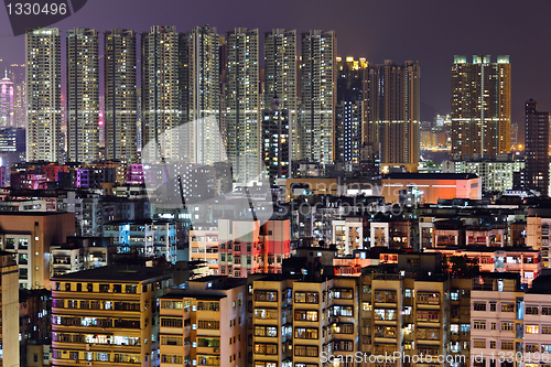 Image of apartment building at night