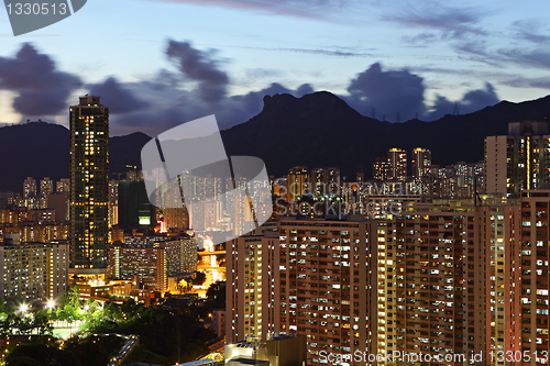 Image of crowded building at night in hong kong