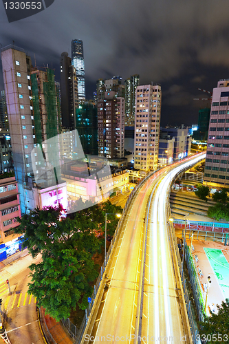 Image of modern city and highway at night