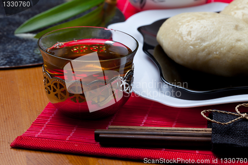 Image of red tea and korean cakes pyan-se