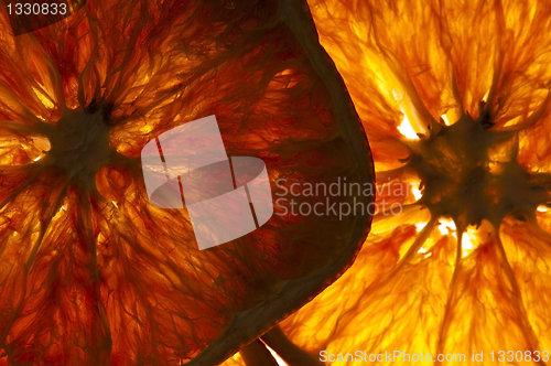 Image of dried orange slices isolated on white background 
