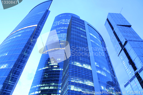 Image of four blue skyscrapers