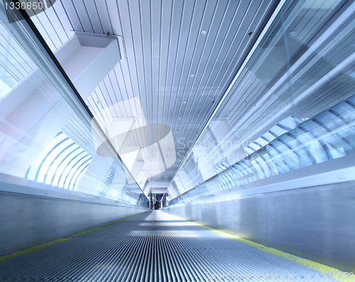 Image of moving horizontal escalator