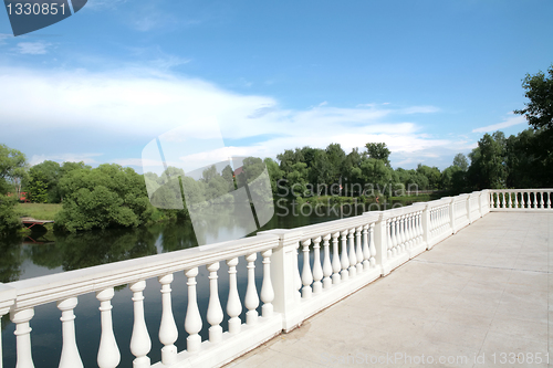 Image of country landscape with white balustrade