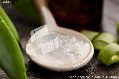 Image of aloe vera juice with fresh leaves