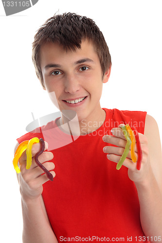 Image of Boy holding handful of snakes