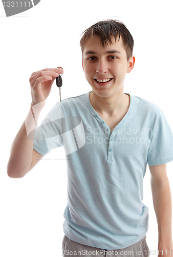 Image of Happy teen with car key