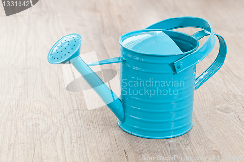 Image of Blue water can