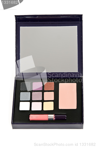 Image of cosmetic set with shadows for the eyes and lipstick