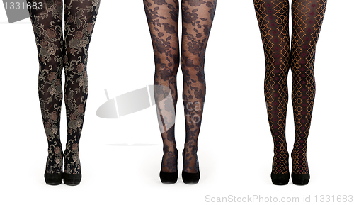 Image of A collage made up of three pairs of female legs in pantyhose and