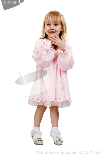 Image of little girl in a pink dress in studio