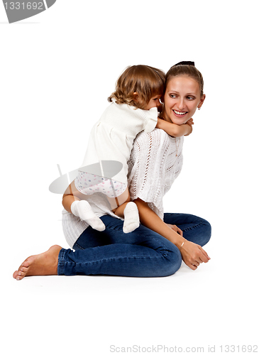 Image of mother and little daughter in the studio