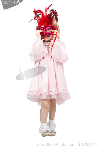 Image of little girl in a red mask in studio