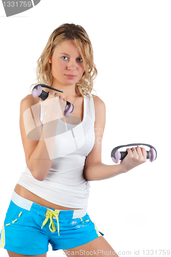 Image of Woman with dumbbells.