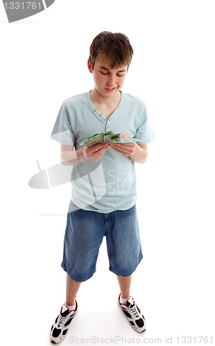 Image of Teenager counting his money