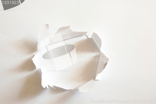 Image of hole in paper