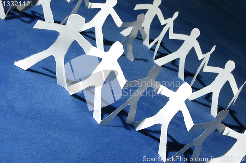 Image of paper people having a party