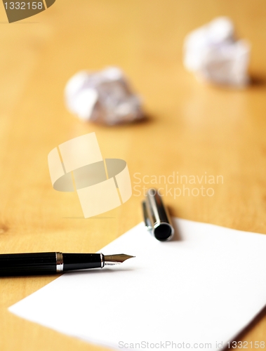 Image of pen and paper