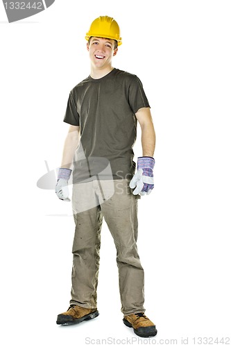 Image of Young construction worker smiling