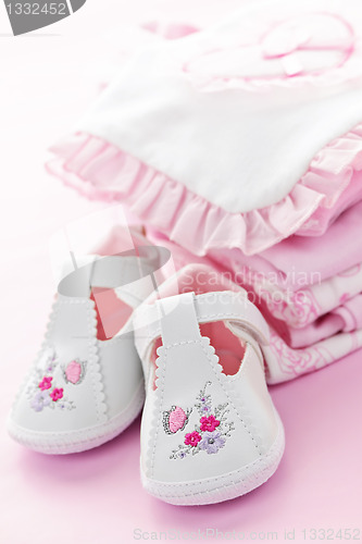 Image of Pink baby clothes for infant girl