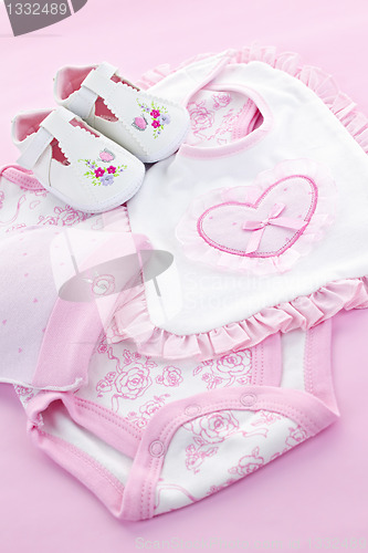 Image of Pink baby clothes for infant girl