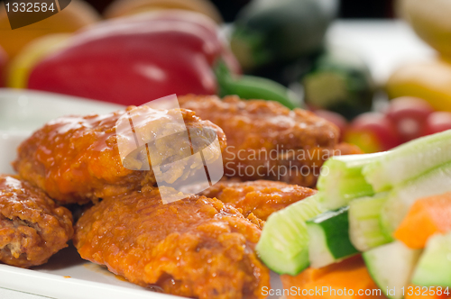 Image of  buffalo chicken wings served with pinzimonio