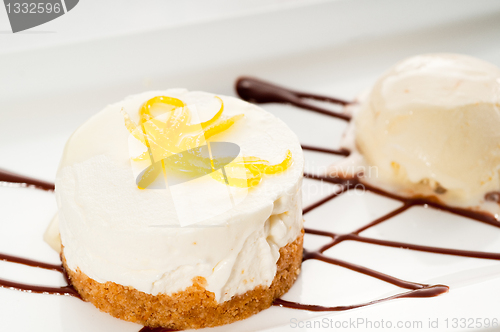 Image of  lemon mousse served whith lemon peel on top